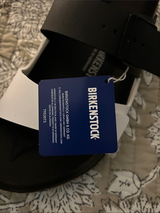 Birkenstock Men’s Two-Tone Buckle Slide Sandals in White and Black